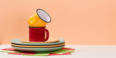 Holiday celebration. Birthday or party decoration. Festive dinner. Plates, cups and napkins. Copy space. Event design