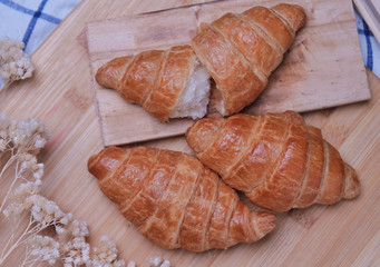 Croissants on the wooden board