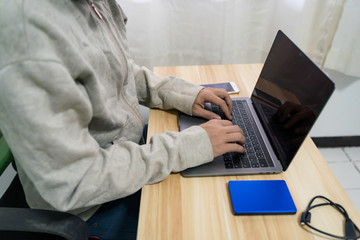 Human working on the laptop