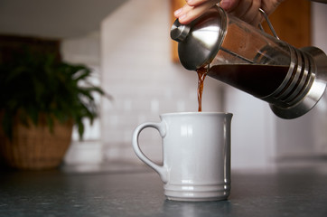 Fresh coffee being poured from a cafetiere