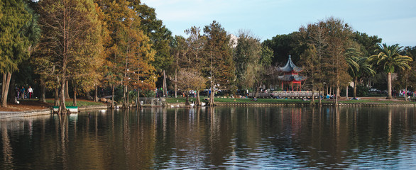 stroll through downtown Lake Eola on Orlando Florida on a fall winters afternoon. Lake Eola Park is located in the heart of Downtown Orlando, with a sidewalk that circles the lake .9 miles in length © Tamara Sales 