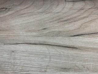 Background texture: the structure of a wooden surface. Decorative board, close-up. Material for making furniture.