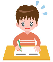 頑張って勉強する男の子