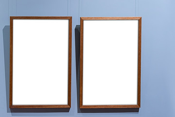 Gallery mock up two frame in interior blue wall