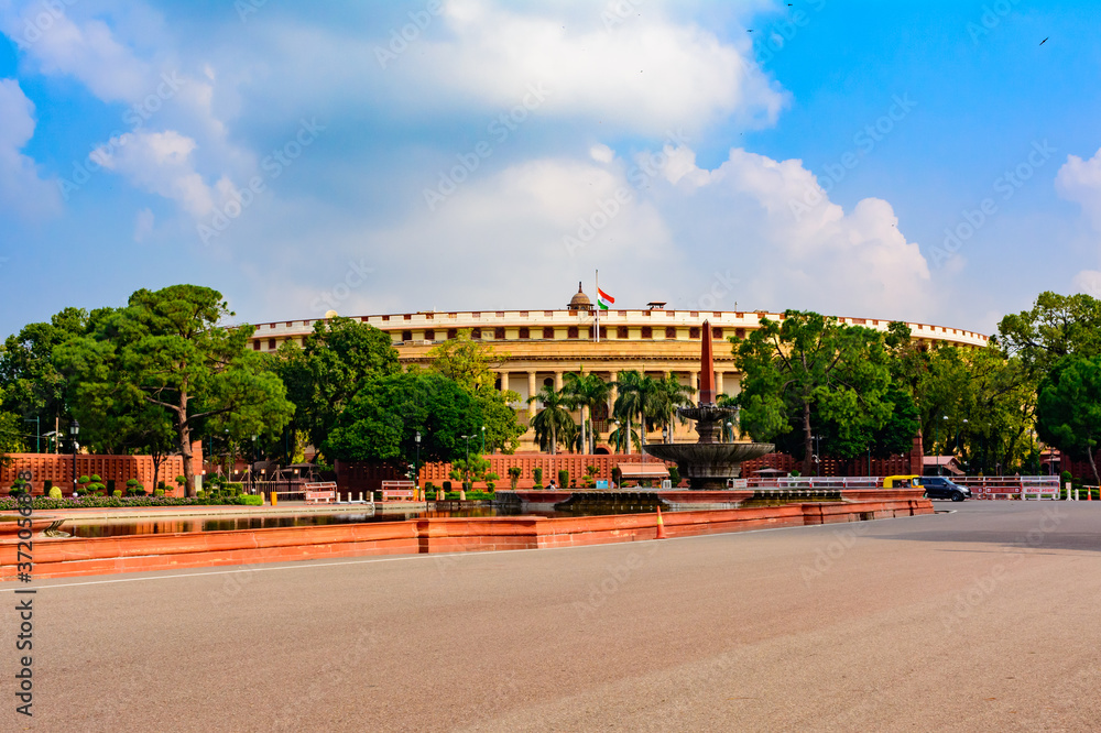 Wall mural The Sansad Bhawan or Parliament Building is the house of the Parliament of India, New Delhi.  It was designed based on  Ashoka Chakra by the British architect Edwin Lutyens & Herbert Baker in 1912-13.