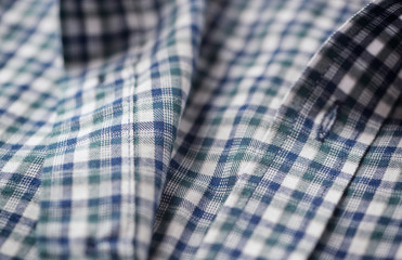 Close up of Men's checkered shirt.
