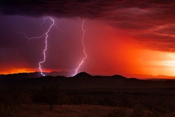 Lightning storm at sunset