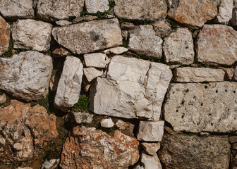 The ancient wall with rough stones, Jerusalem, old city.