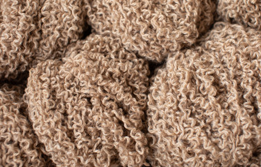 Woolen yarn for knitting. Wool thread for knitting. Own hand. Knitting and needlework. Yarn for a scarf, sweater and socks