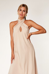 Beautiful woman fashion model makeup blond hair perfect body shape tanned skin wear clothes summer collection organic midi beige silk dress stylish sandals shoes, accessory romantic date walk.