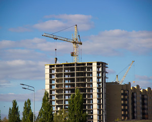 
Building under construction with a crane