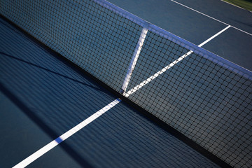 Tennis court lines with shadow