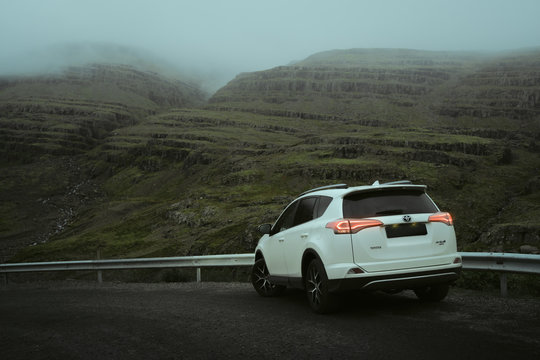 Southern Region, Iceland - September 11, 2019: White car Toyota RAV4 is parked at countryside road in Iceland. Rental car