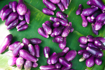 A Pile ripe eggplant purple ready for sale at maket