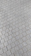 Fragment of the pavement, finished with graceful polished stone