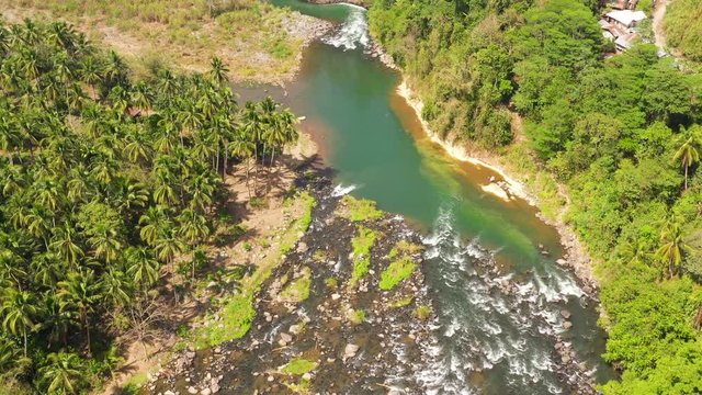 Tropical landscape: River and rainforest. Cagayan de Oro river. Mindanao, Philippines.
