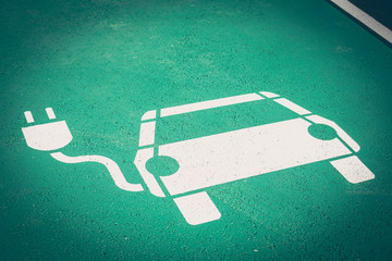 Parking symbol on the street for electric cars being charged