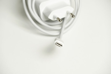 smartphone charger with usb type c on a white background. technology concept