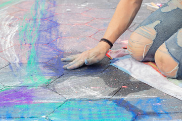 Drawing chalk on the street