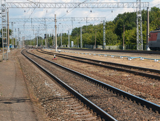 Fototapeta na wymiar railway tracks stretching into the distance, power to the Railways