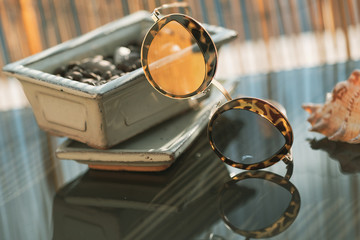 Cat eye sunglasses special model for ladies with special design lenses reflecting the sun. Selective focus 