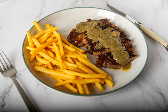 Scott fillet with french fries and homemade mustard sauce 