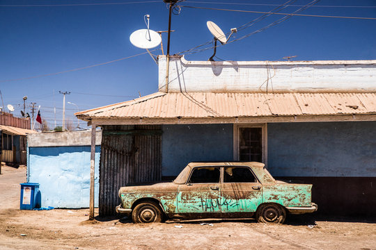 old shabby car in a old mining village
