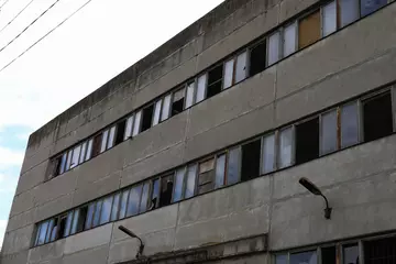 Fototapeten Verlassene Gebäude An abandoned factory or factory in a dilapidated and plundered state.  © Iurii Gagarin