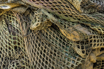 Detail of a historic military camouflage disguise net.