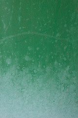 Green old iron garage wall