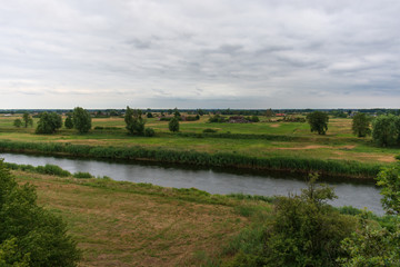 Obraz premium The view from the tall bridge over the river valley