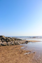 Fototapeta na wymiar beach sea and rocks