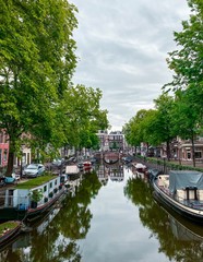 Fototapeta premium Canals in Amsterdam, Netherlands