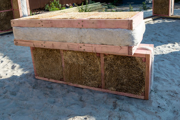 Straw blocks for the construction of environmentally friendly homes.