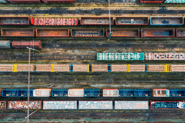 Drone view of rail cargo transportation. Freight wagons from above.