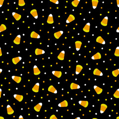 Seamless pattern for the holiday Halloween with candies and sweets. Corn grains sugar lollipops and candy dots on a black background. For children, textiles and paper.