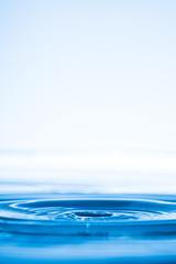 Water drop splash. Blue water	