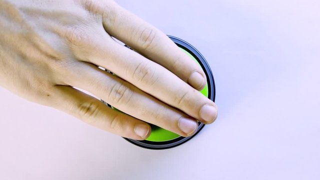Business person pushing green glossy money button with dollar sign. Press button to earn big bucks. 4K video for payment system, financial institution, stock market, digital wallet, crediting, banks
