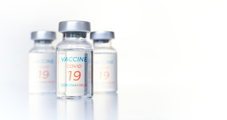 Obraz premium Closeup transparent vials with new vaccine for covid-19 coronavirus, flu, infectious diseases. Injection after clinical trials for vaccination of human, child, adult, senior. Medicine, drug concept
