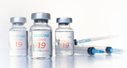 Transparent vials, syringes with new vaccine for covid-19 coronavirus, flu, infectious diseases. Injection after clinical trials for vaccination of human, child, adult, senior. Medicine, drug concept