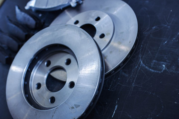 set of brake discs and car pads.