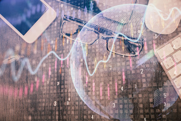 Multi exposure of forex graph hologram over desktop with phone. Top view. Mobile trade platform concept.