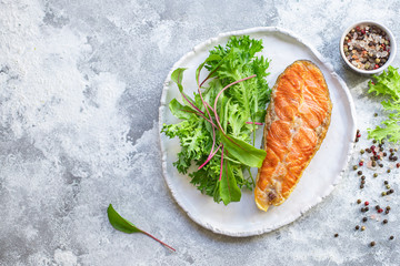 salmon fried steak fillet fish seafood natural product ingredient second course eating healthy top view place for text copy space keto or paleo diet raw pescetarian