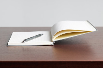 open blank diary or notebook with pan. storytelling concept. planning concept. minimal