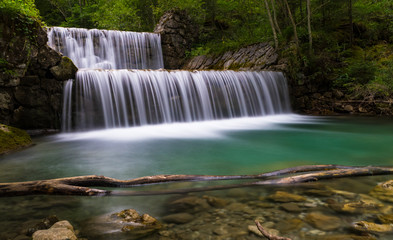 Waterfalls of river Vils, cloudy summer day, long exposure