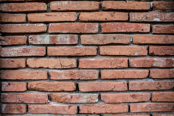 Orange brick wall in old ancient city.  - Powered by Adobe