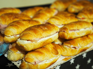 Canapes Assortment on silver tray on table background. Catering concept.