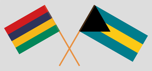 Crossed flags of Mauritius and Bahamas