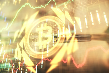 Double exposure of crypto currency theme drawing hologram over coffee cup background in office....