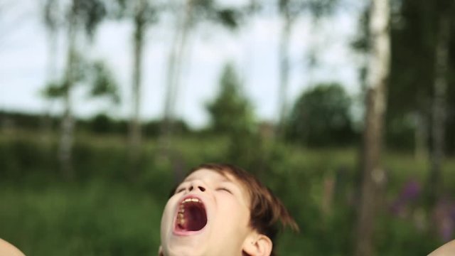 boy shouts with all his strength